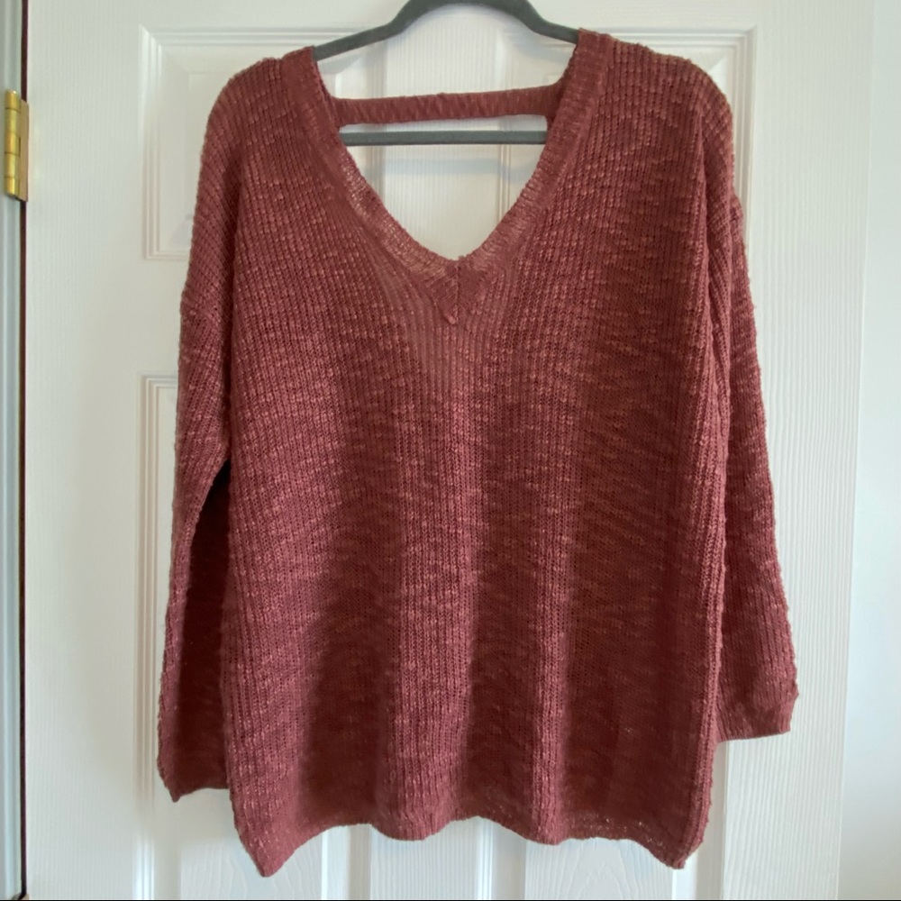 V neck sweater with cut out back